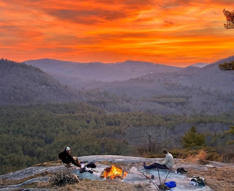 Campfire and sunset views from the granite face at Little Green camp
